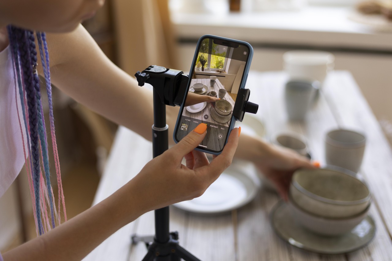 woman-taking-photos-her-business-with-ceramic-kitchenware