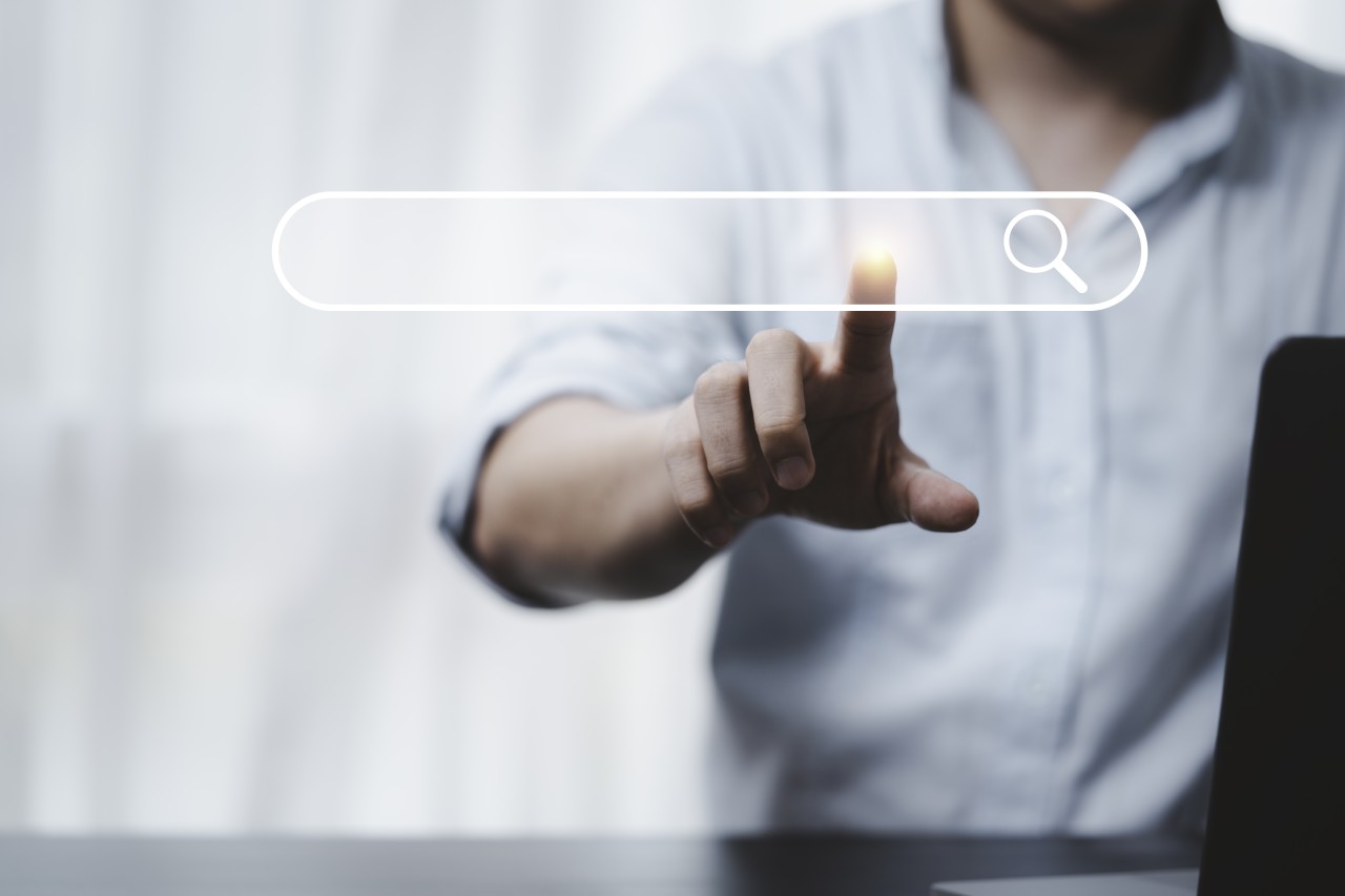 hand-touching-with-search-icon-search-engine-optimisation-seo-concept-find-information-by-internet-connection